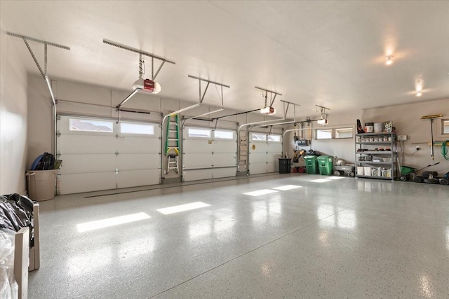 garage featuring a garage door opener