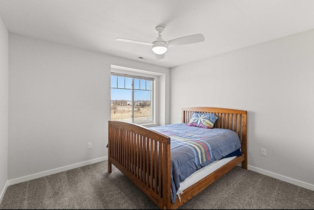 bedroom featuring visible vents, baseboards, and carpet