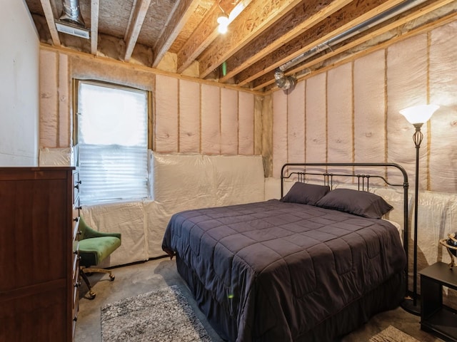 bedroom with concrete floors