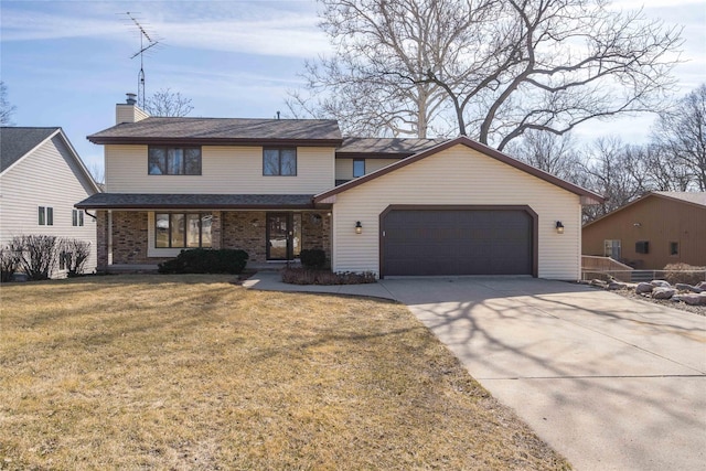 traditional-style house with brick siding, concrete driveway, a front yard, a chimney, and a garage