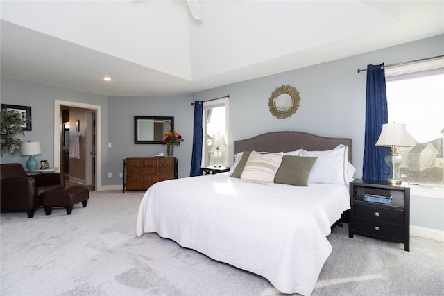 bedroom featuring recessed lighting, baseboards, carpet floors, and multiple windows