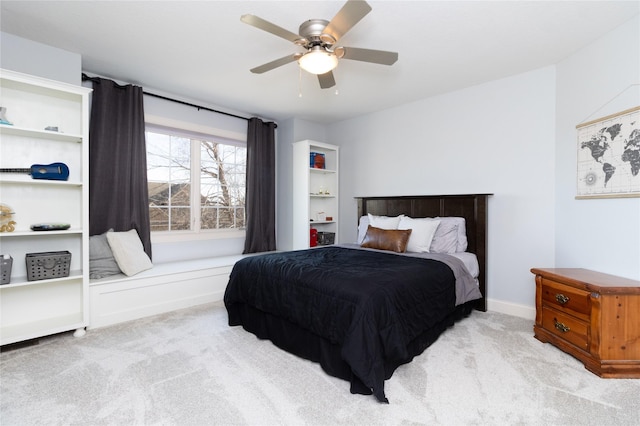 bedroom featuring baseboards, carpet, and ceiling fan