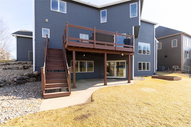 back of property with a patio, fence, central AC, stairs, and a deck