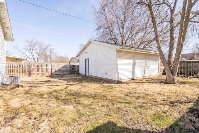 exterior space featuring central AC unit and fence