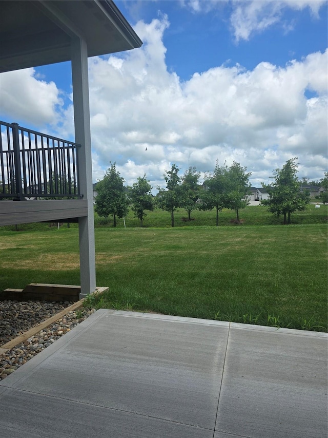 16203 Goodman Dr, Urbandale, IA 50323 - view of grassy yard with a patio area
