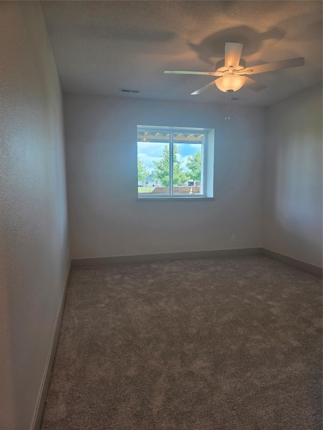 16203 Goodman Dr, Urbandale, IA 50323 - empty room featuring carpet flooring and ceiling fan