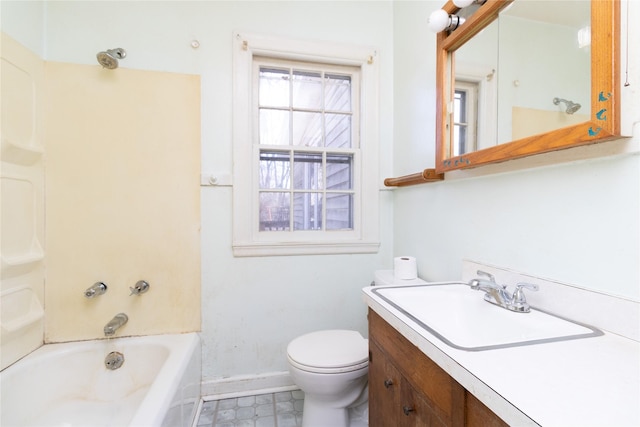 full bathroom with tile patterned floors, washtub / shower combination, toilet, and vanity