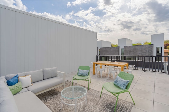 view of patio with outdoor dining space and an outdoor hangout area