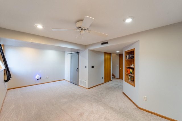 interior space featuring visible vents, recessed lighting, baseboards, light colored carpet, and ceiling fan