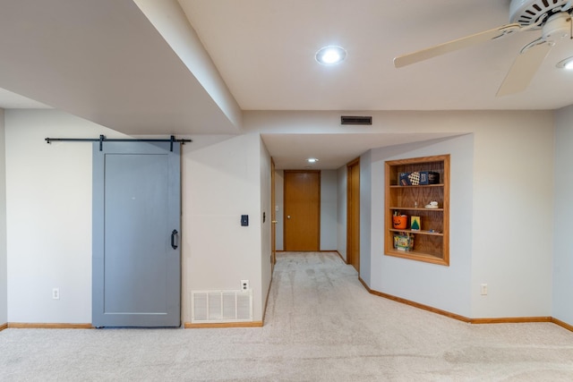 1013 10th Ave NW, Altoona, IA 50009 - spare room featuring light carpet, baseboards, recessed lighting, and ceiling fan