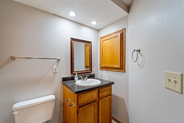 1013 10th Ave NW, Altoona, IA 50009 - bathroom featuring toilet and vanity