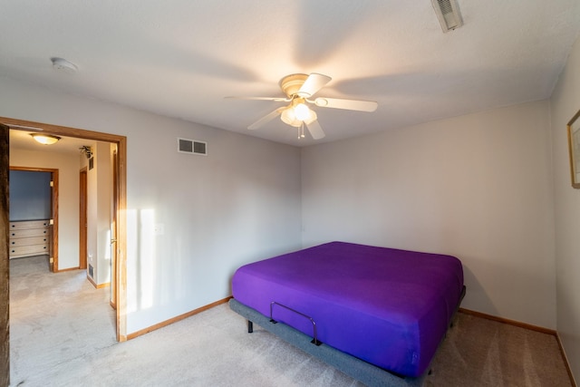 bedroom featuring visible vents, ceiling fan, baseboards, and carpet