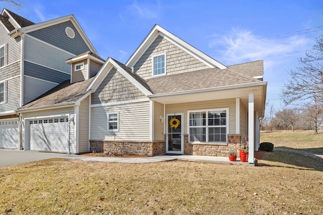 view of front of home featuring concrete driveway, stone siding, roof with shingles, and a front lawn