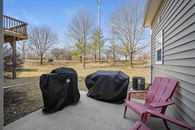 view of patio / terrace with grilling area and central AC unit