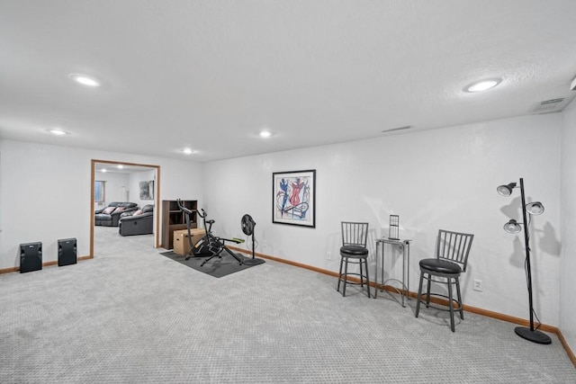 workout area featuring recessed lighting, baseboards, carpet floors, and visible vents