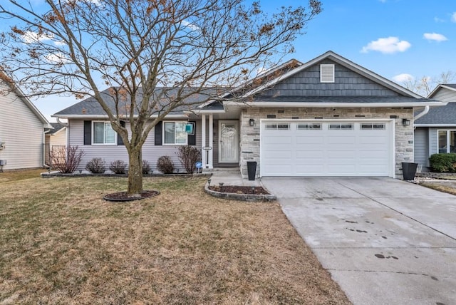 ranch-style house featuring a front lawn, concrete driveway, and an attached garage