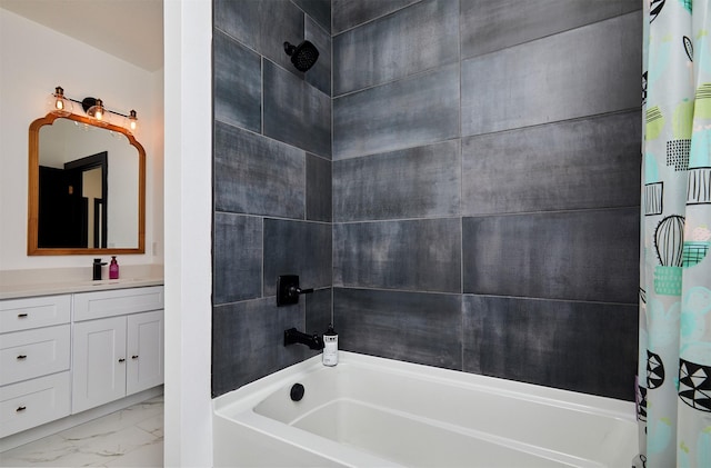 bathroom featuring marble finish floor, vanity, and shower / bathtub combination with curtain