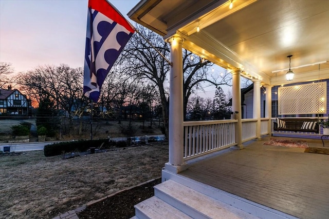 wooden deck featuring a porch