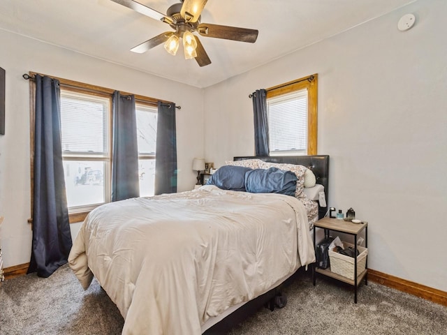 410 1st St S, Newton, IA 50208 - bedroom featuring baseboards, carpet, and ceiling fan