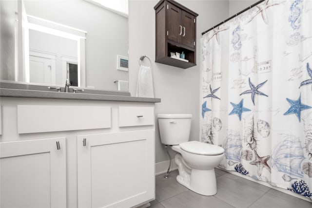 full bathroom with baseboards, toilet, a shower with curtain, tile patterned floors, and vanity