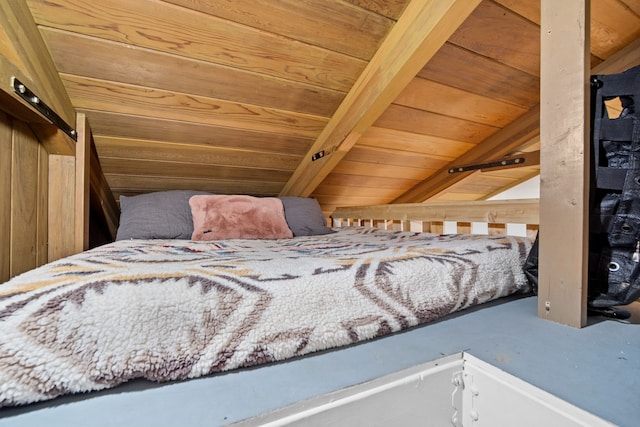 bedroom with vaulted ceiling with beams, wood ceiling, and wooden walls