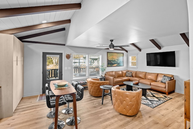 living room featuring vaulted ceiling with beams, baseboards, light wood finished floors, and ceiling fan