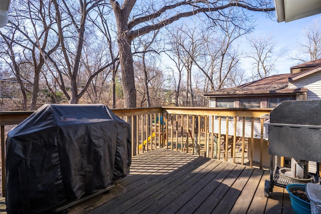 wooden terrace with grilling area