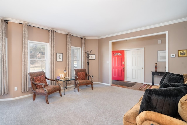 carpeted living room with baseboards and ornamental molding