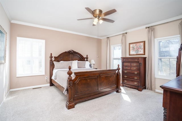 bedroom featuring light carpet, baseboards, and ornamental molding