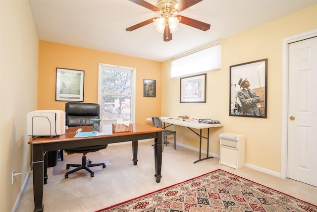 office with baseboards, carpet, and ceiling fan