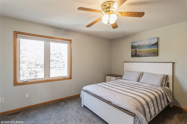 bedroom with visible vents, baseboards, and carpet