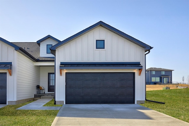 modern inspired farmhouse with an attached garage, board and batten siding, concrete driveway, and a front lawn