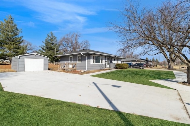 ranch-style house with an outdoor structure, driveway, a garage, and a front yard