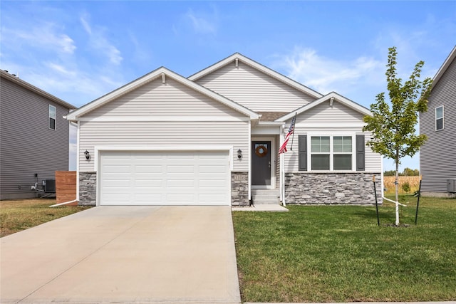 craftsman inspired home with a garage, stone siding, a front lawn, and driveway