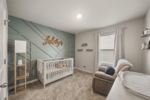 bedroom with baseboards and carpet floors