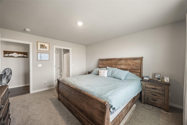 carpeted bedroom with baseboards