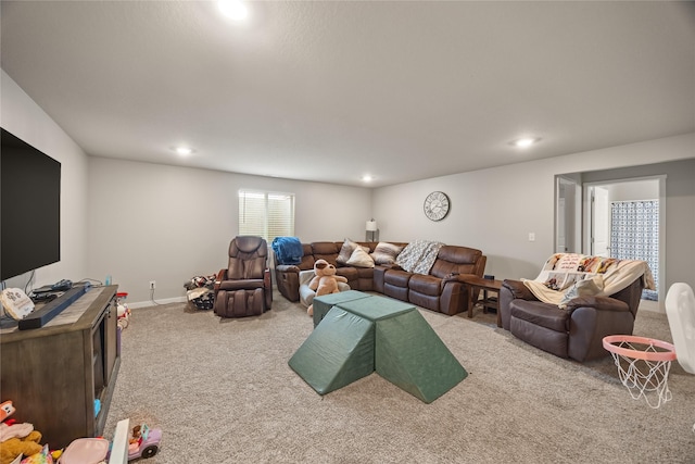 living room featuring recessed lighting, baseboards, and carpet floors