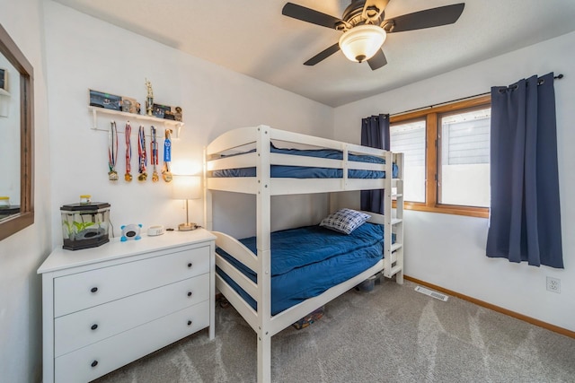 bedroom with visible vents, a ceiling fan, baseboards, and carpet floors