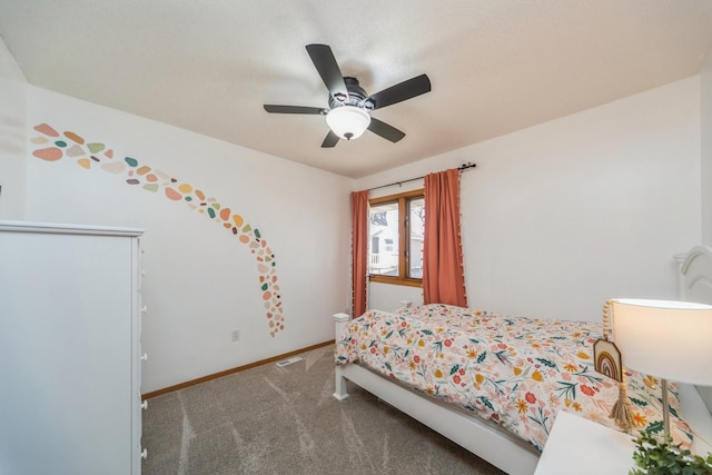 bedroom featuring carpet flooring, baseboards, visible vents, and ceiling fan