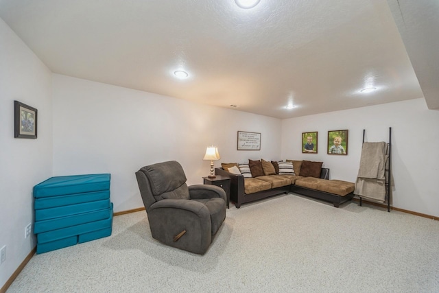 living room with baseboards and carpet flooring