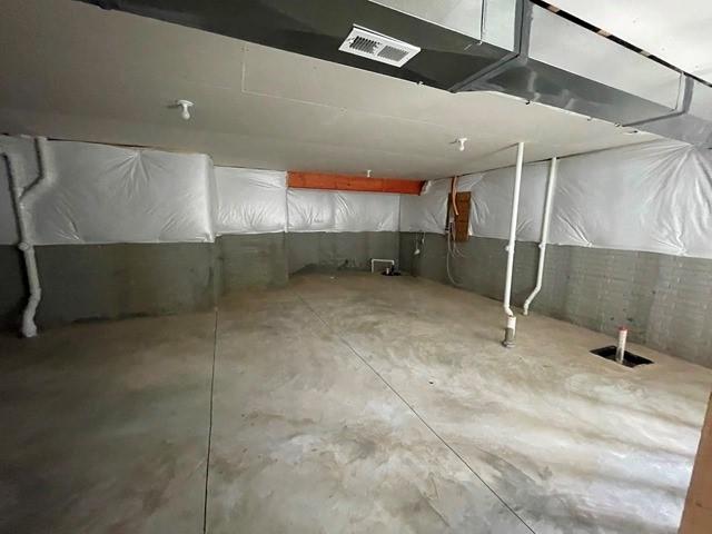 unfinished basement with visible vents