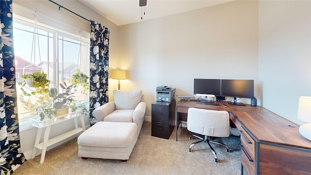 home office featuring carpet floors and ceiling fan