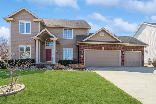 traditional home with a front yard, driveway, a shingled roof, a garage, and brick siding