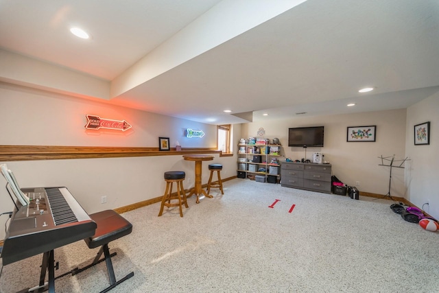 playroom with recessed lighting, baseboards, a bar, and carpet flooring