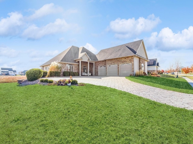 view of front of house featuring an attached garage, decorative driveway, a front yard, and roof with shingles