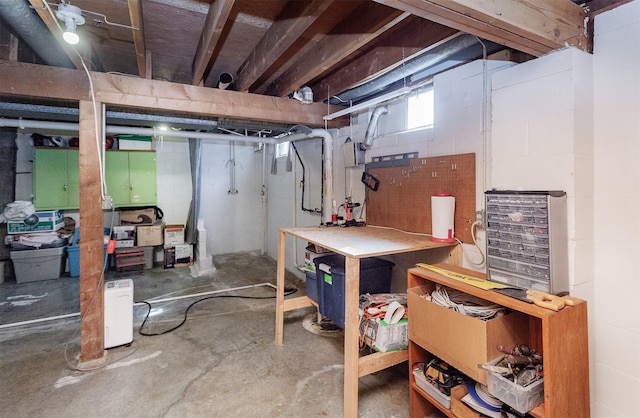 basement featuring a workshop area