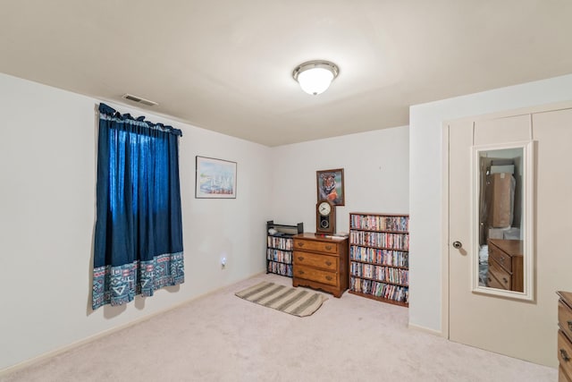 carpeted bedroom with visible vents