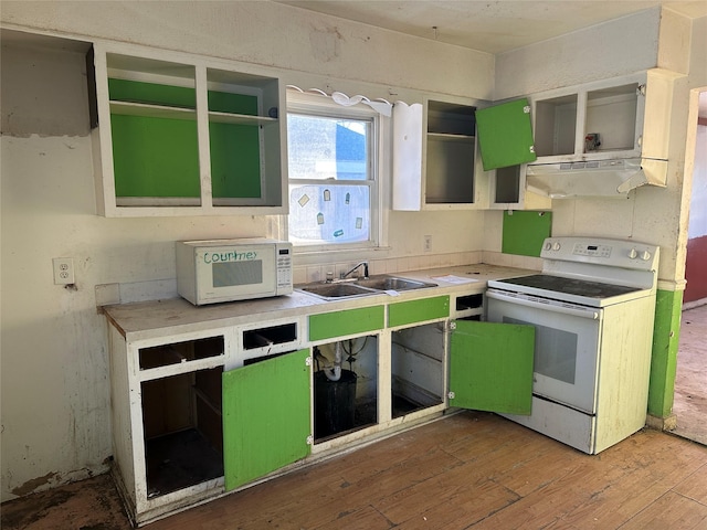 kitchen with open shelves, under cabinet range hood, wood finished floors, white appliances, and green cabinetry