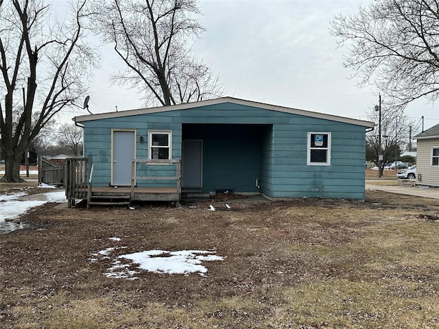 view of front facade with a deck