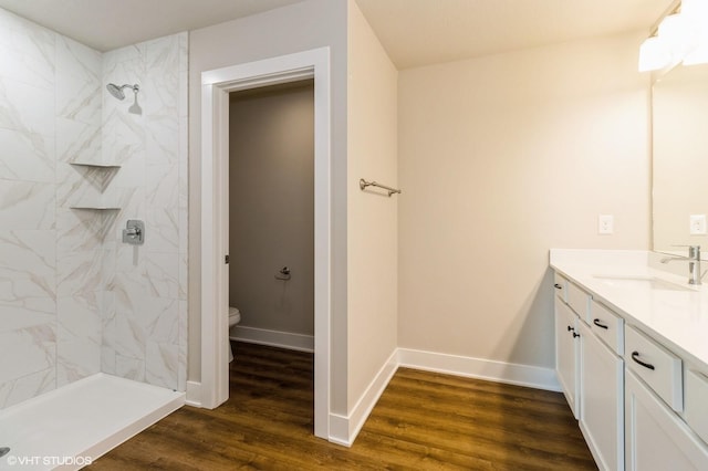 136 Creekside Dr, Bondurant, IA 50035 - full bath with vanity, a marble finish shower, and wood finished floors